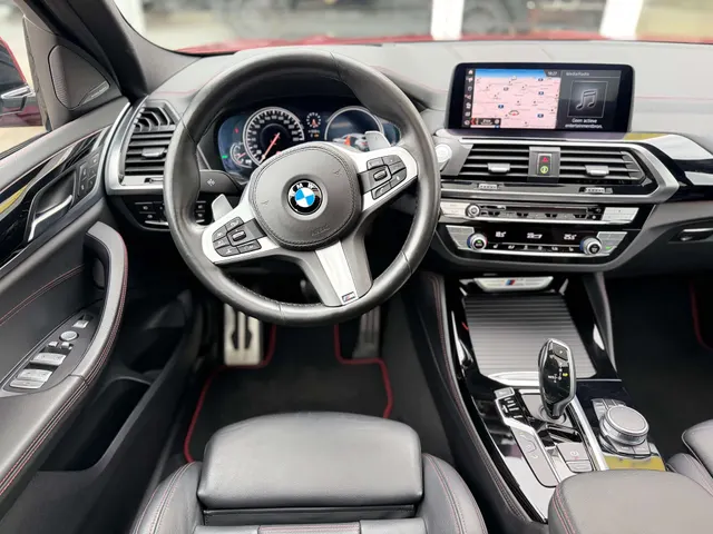 BMW X4 M 2019 vor dem Showroom von Raf Cars in Ninove-Outer, Foto 18