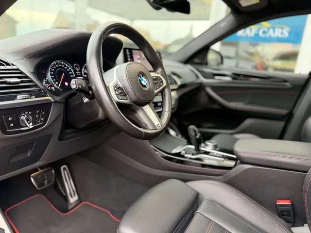 BMW X4 M 2019 vor dem Showroom von Raf Cars in Ninove-Outer, Foto 20